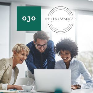 OJO and The LEAD Syndicate with real estate agents working together at a laptop