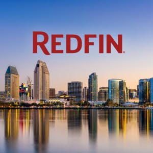 Redfin logo against a backdrop of the San Diego skyline