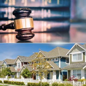 A judge's gavel and a row of suburban homes