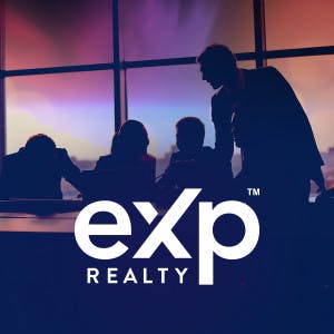 The eXp Realty logo and silhouettes of people in a conference room