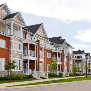 A row of multifamily rental townhomes