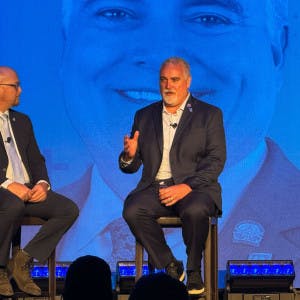 Clint Skutchan and NAR President Kevin Sears on stage at the T3 Leadership Summit in Scottsdale, AZ, on April 23.