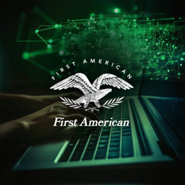 First American Financial logo and hands typing on a laptop