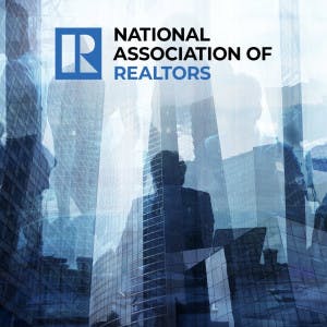 The National Association of Realtors logo and silhouettes of business people and office buildings