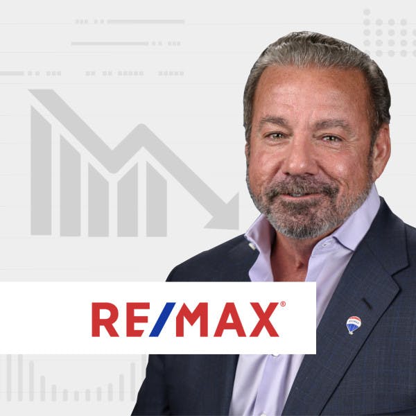 Steve Joyce with RE/MAX logo and downward data in background