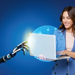 Woman holding laptop with a robotic arm reaching out to touch it