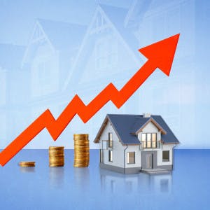 Interest Rates: Red arrow going upwards over a house and coins