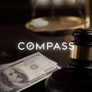 Compass Real Estate logo and a gavel and hundred-dollar bills