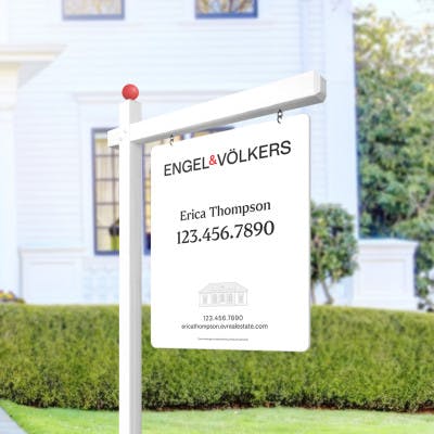 An Engel & Volkers property sign featuring the company's new logo.