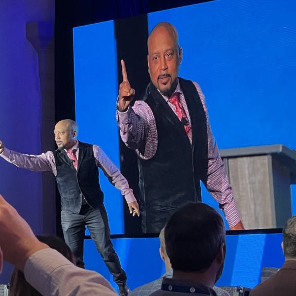 Daymond John speaks from the stage at the T3 Sixty Summit in Naples, Florida.