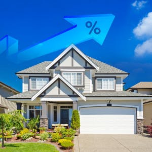 An upward arrow with a percentage sign above a suburban home