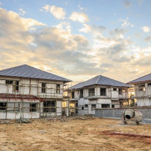 A row of homes under construction.