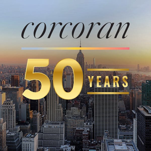 "Corcoran 50 years" over an aerial image of Manhattan.