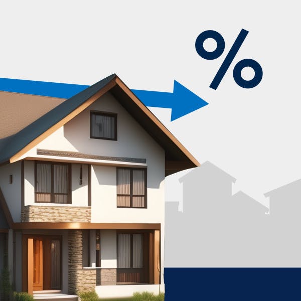 A house with a slightly downward arrow representing a small decline in mortgage rates.