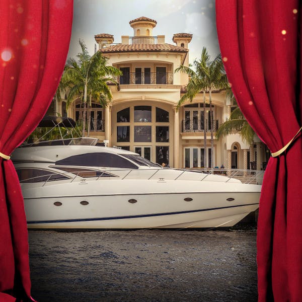 Celebrity buyers: Red curtains parted with image of yacht in front of luxury house