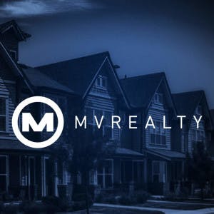 A dark row of houses and the MV Realty logo.