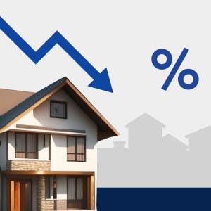 A house with a downward trend line and a percentage sign.