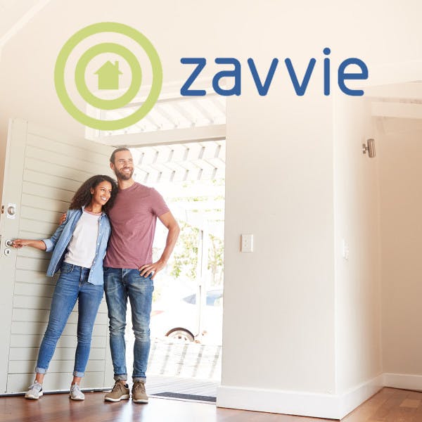 Photo of couple looking at house with Zavvie logo overlayed above