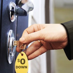 Zero down payments - USDA and VA: Man unlocking door